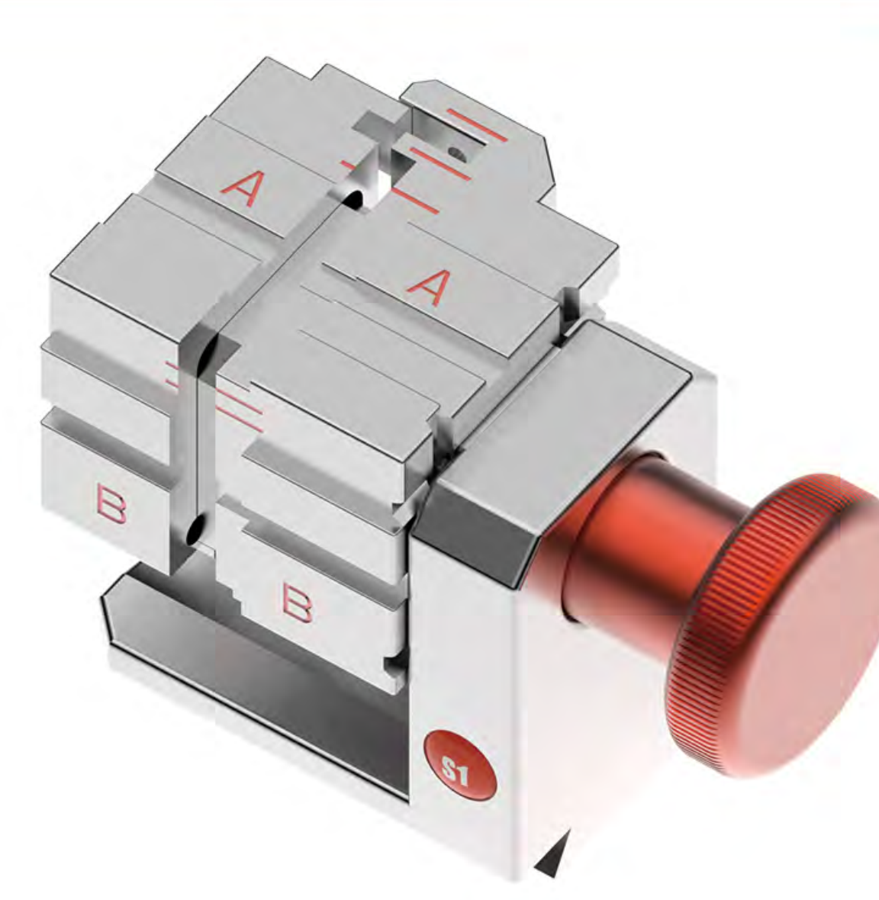 S1 four-way jaw — the fixture that holds the key